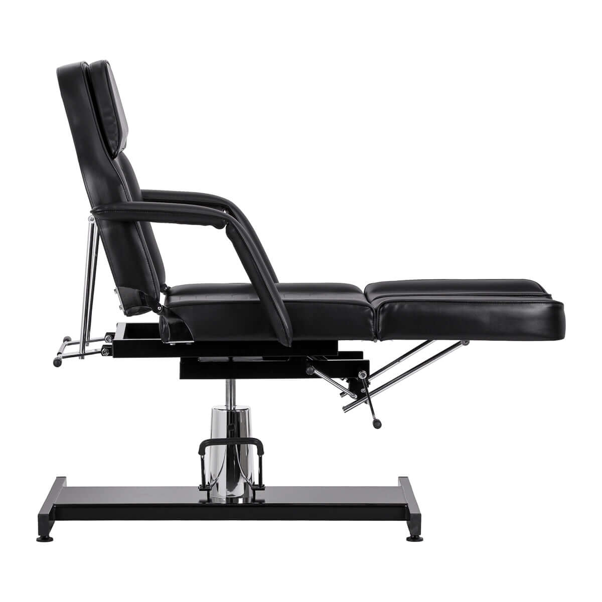 Fotel kosmetyczny hydrauliczny do pedicure Sillon 210 z kołyską i dzielonym podnóżkiem czarny w profilu.
